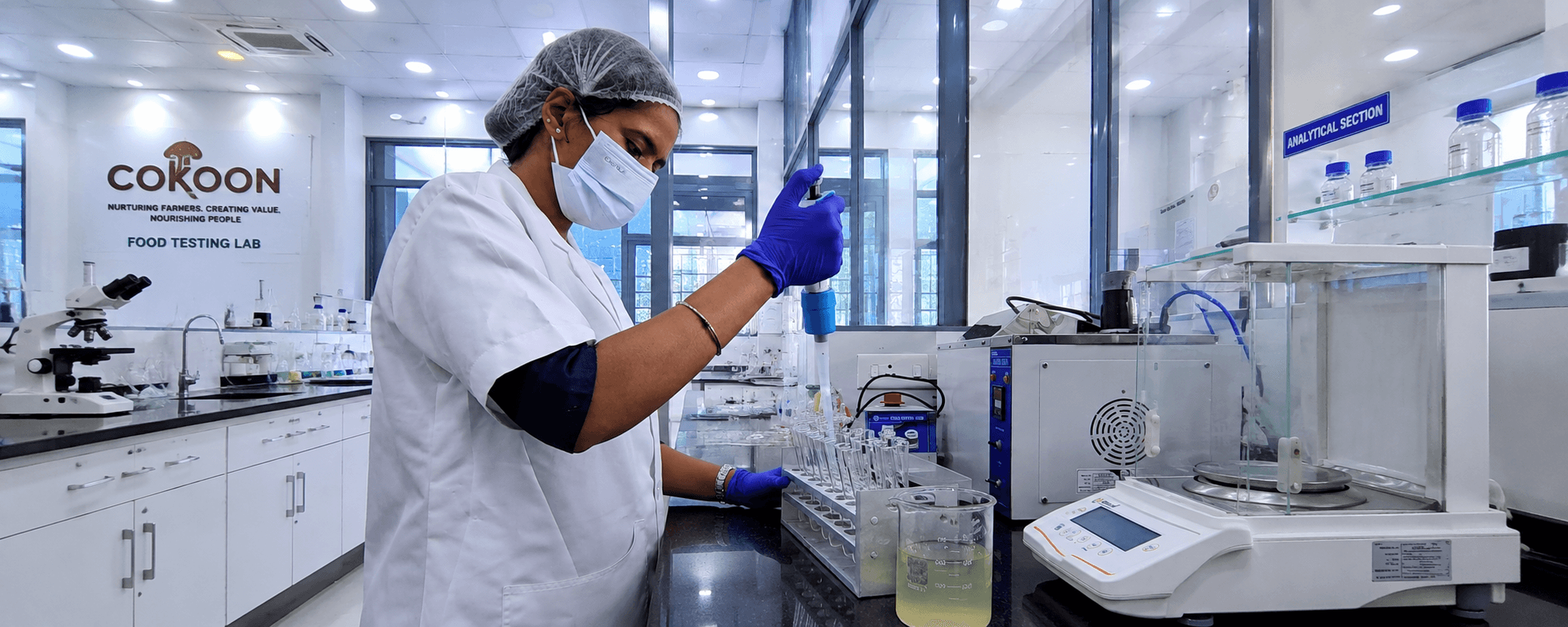 Cokoon food testing laboratory technician conducting analytical testing